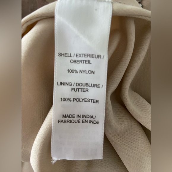 This brand new maxi dress is perfect for a special occasion. - Picture 9 of 13